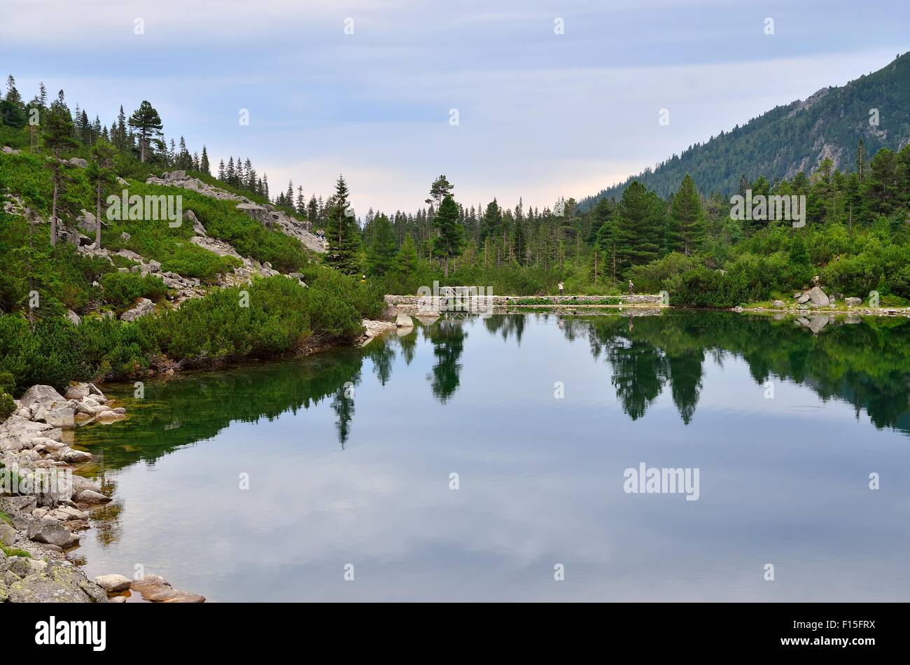 Lake in mountains. Lake Popradske Pleso in High Tatra Mountains, Slovakia. Stock Photo