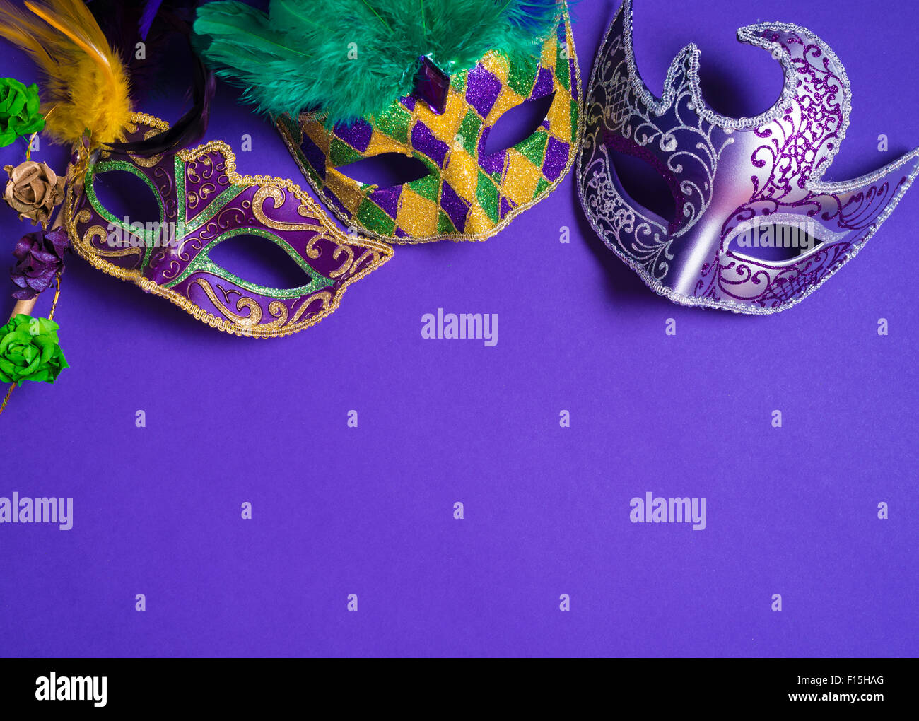 Full frame background of Mardi Gras feather boa and beads Stock