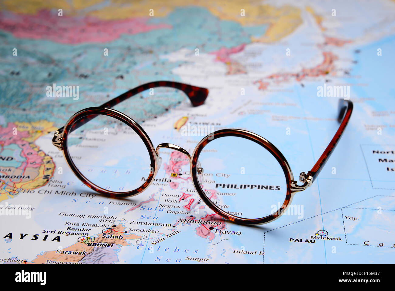 Glasses on a map of Asia - Philippines Stock Photo
