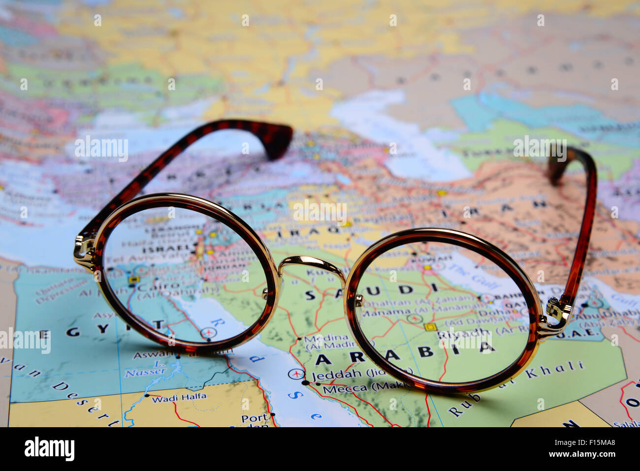Glasses on a map of Asia - Riyadh Stock Photo - Alamy