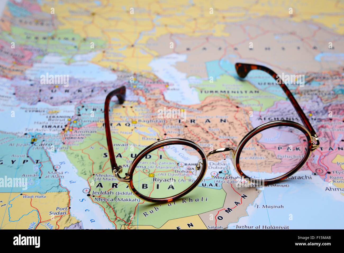 Glasses on a map of Asia - Riyadh Stock Photo - Alamy