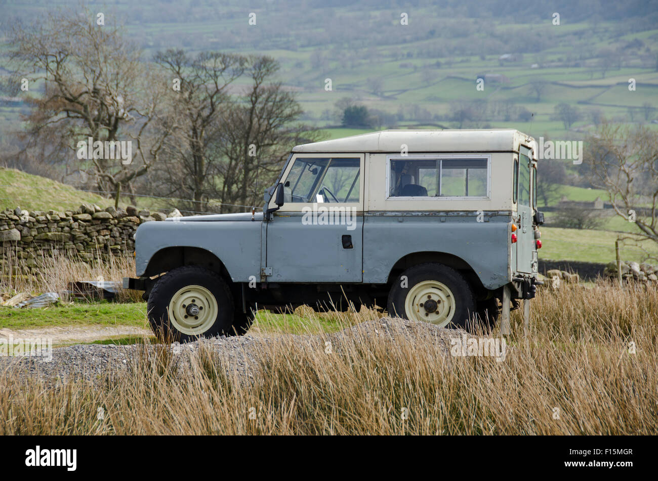 Iconic, classic, rugged, grey, Series IIA Land Rover 4x4 off-road vehicle, parked in a field -  Wharfedale, Yorkshire Dales countryside, England, UK. Stock Photo