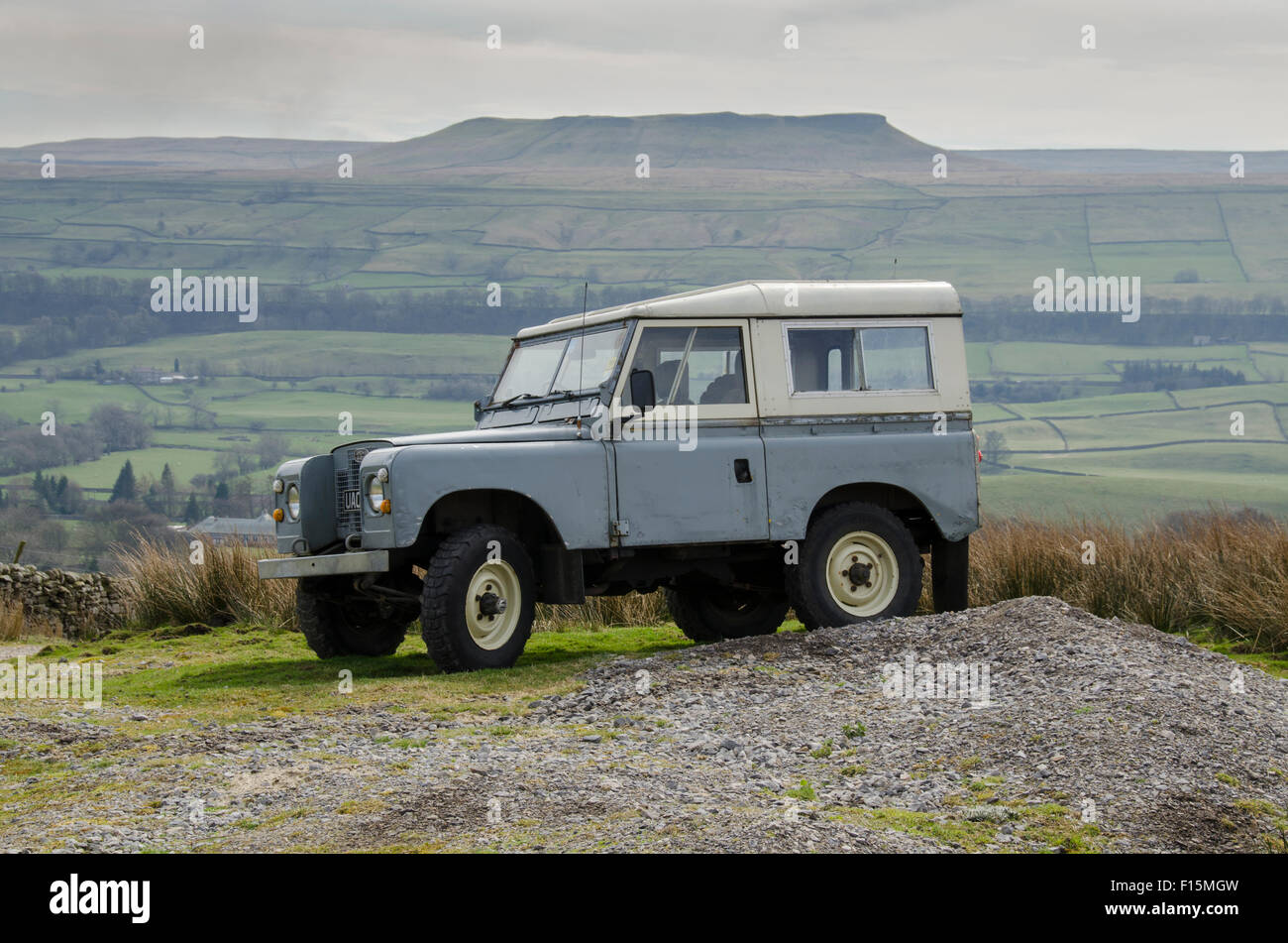 Iconic, classic, rugged, grey, Series IIA Land Rover 4x4 off-road vehicle, parked in a field -  Wharfedale, Yorkshire Dales countryside, England, UK. Stock Photo