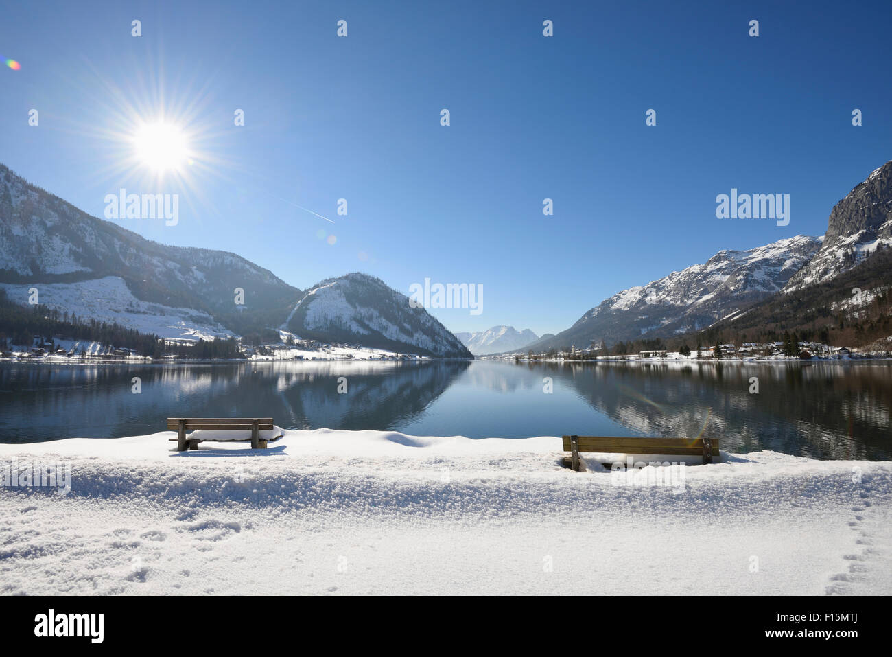 Landscape of Benches in Snow next to Grundlsee Lake in Winter, Liezen District, Styria, Germany Stock Photo