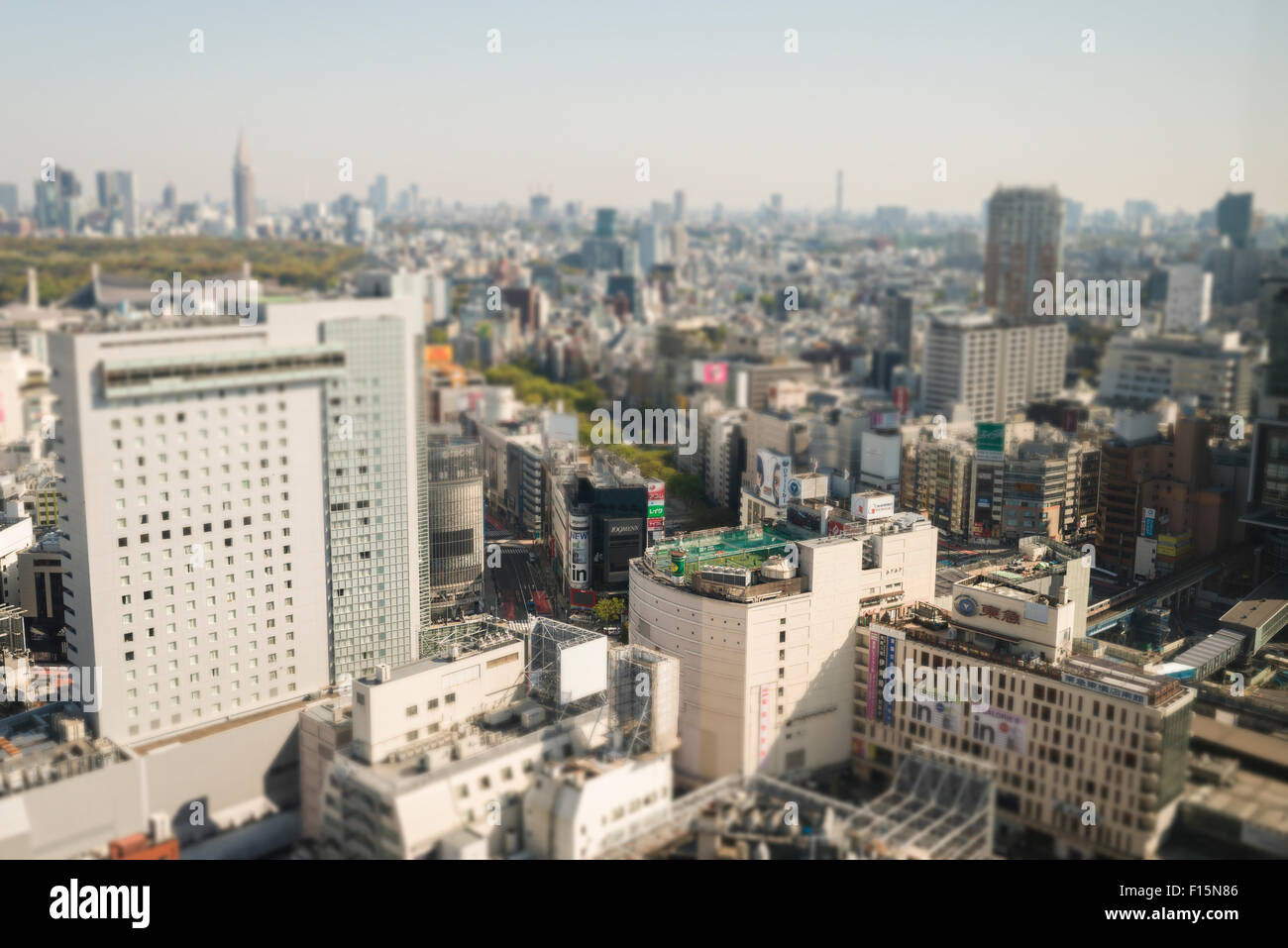 High angle view of Tokyo with soccer field on top of building, viewed