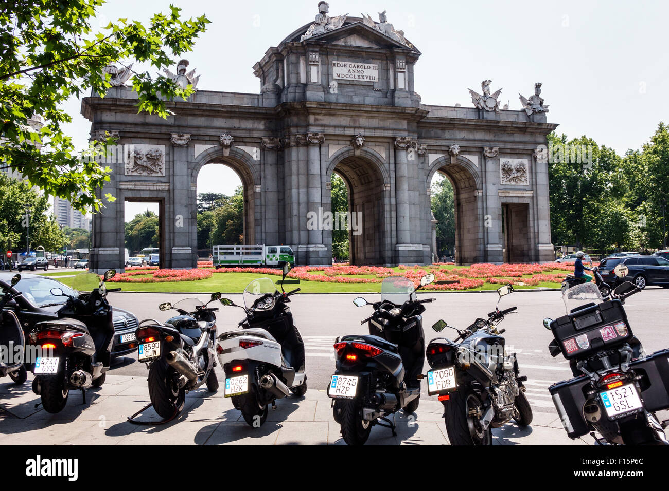 Madrid Spain,Hispanic Salamanca,Recoletos,Plaza de la Independencia,Puerta de Alcala,monument,motorcycles,motor scooters,parked,Spain150629010 Stock Photo