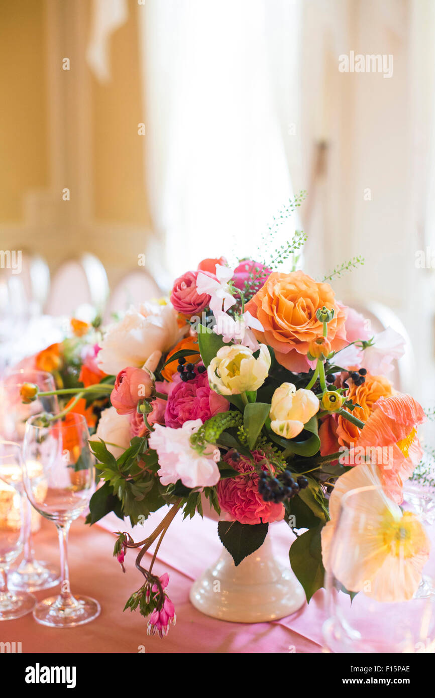 Floral Centerpiece on Set Table Stock Photo