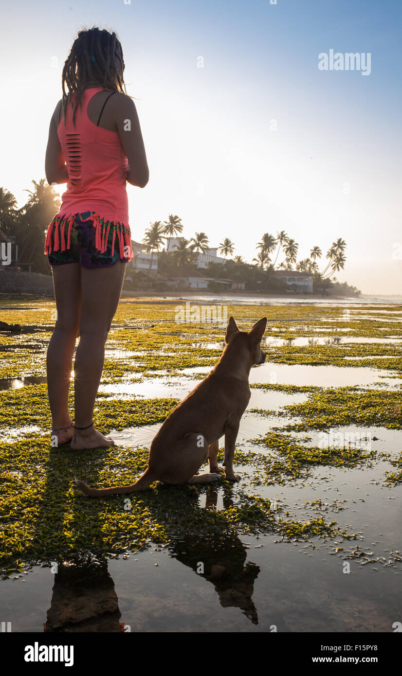 Trendy Hipster Girl with her Dog on Urban Background Stock Photo - Alamy