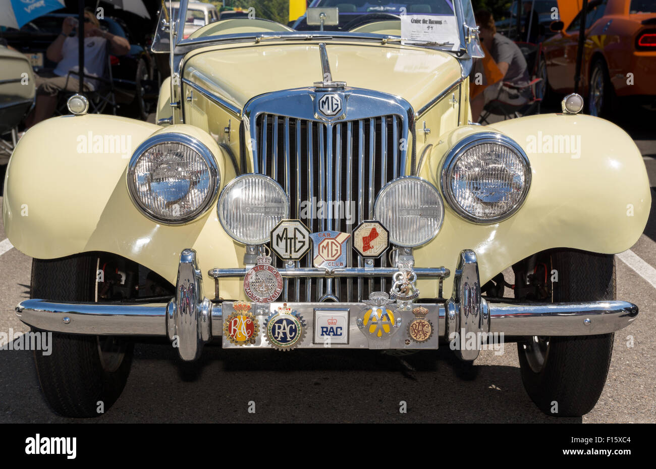 Front view of a yellow 1954 MG at a classic car show, Gig Harbor
