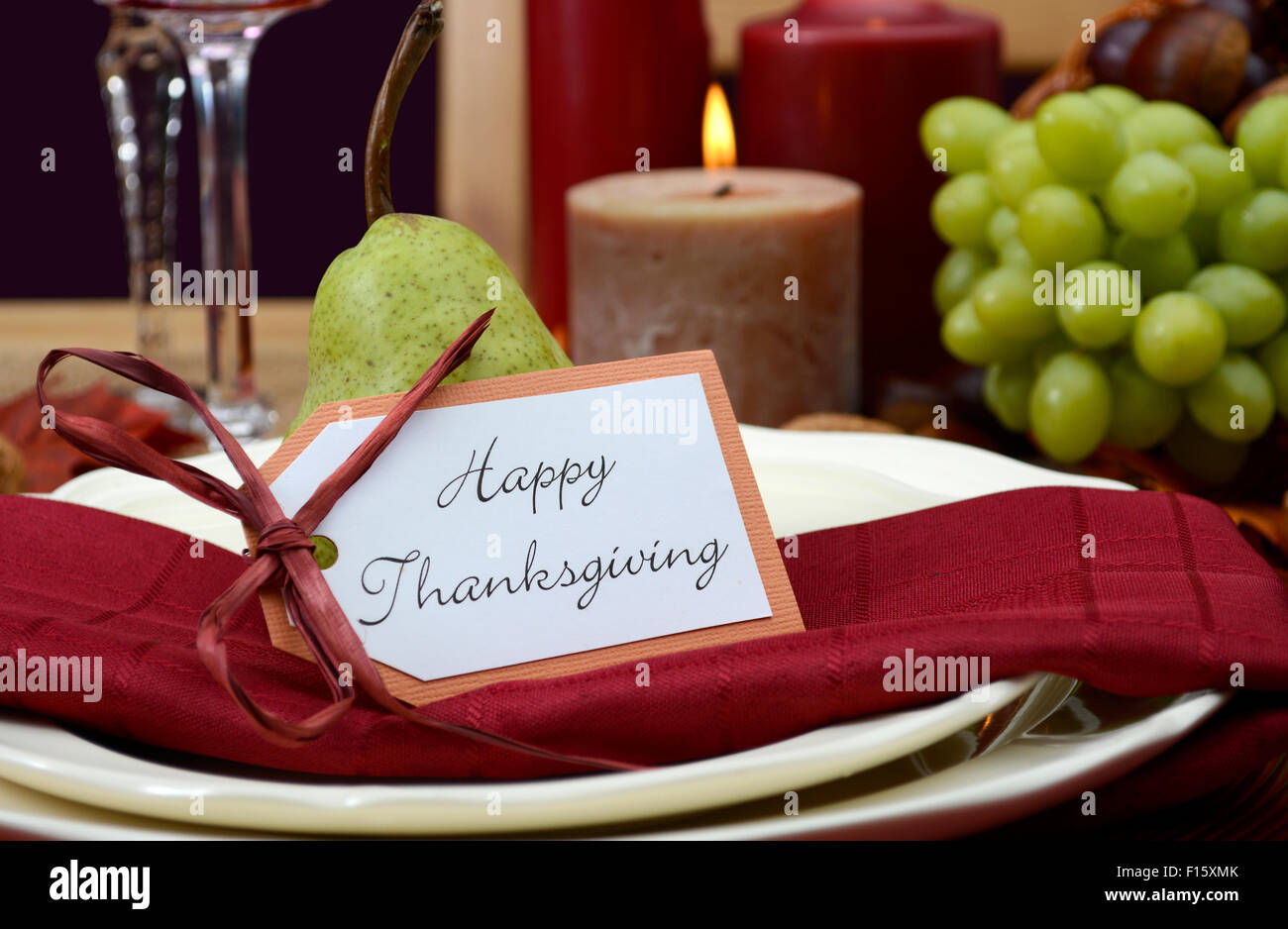 Happy Thanksgiving table setting in classic rustic colors on wood table ...
