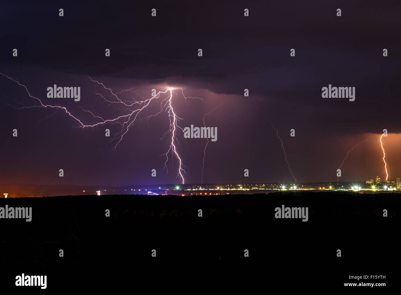 Night thunder lightning over the city sky view Stock Photo - Alamy