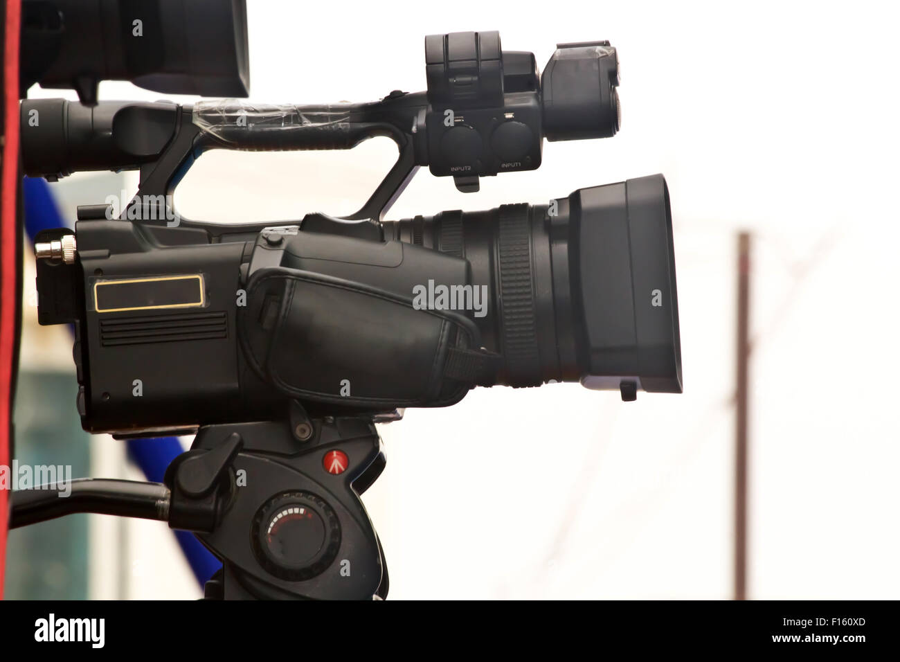 Journalist holding camera Stock Photo Alamy