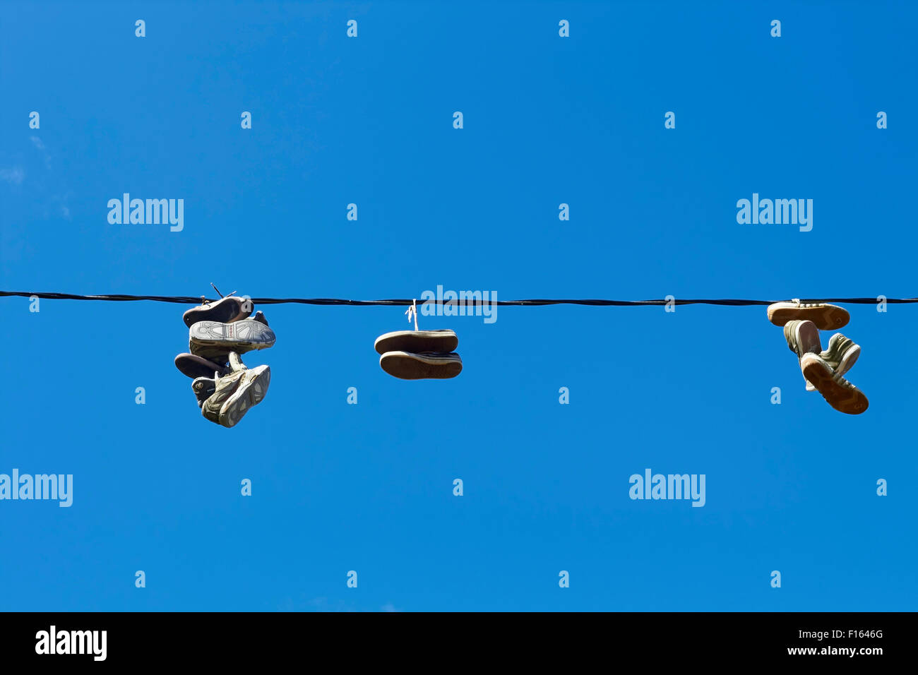 Shoes hanging wire hires stock photography and images Alamy