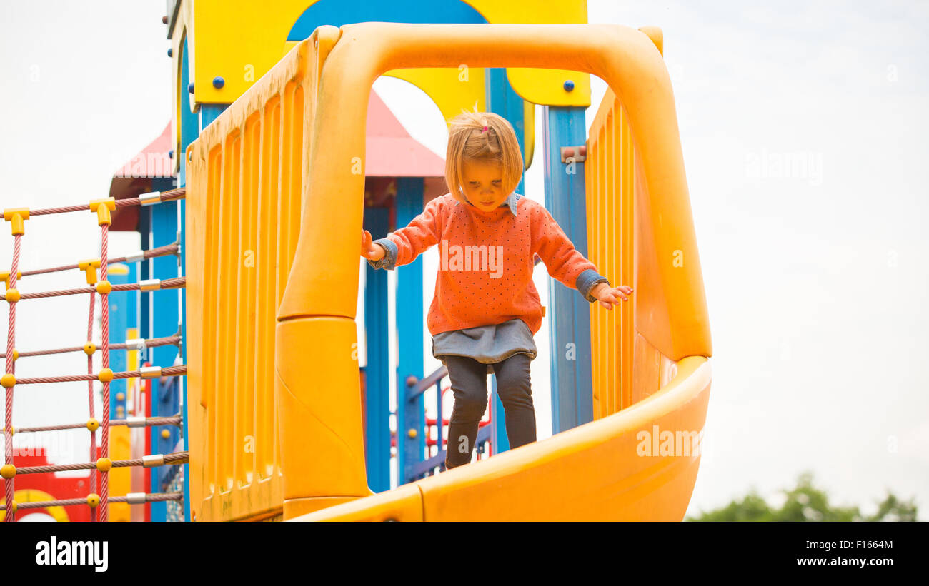 Outdoor portrait of adorable little girl playing in park Stock Photo ...