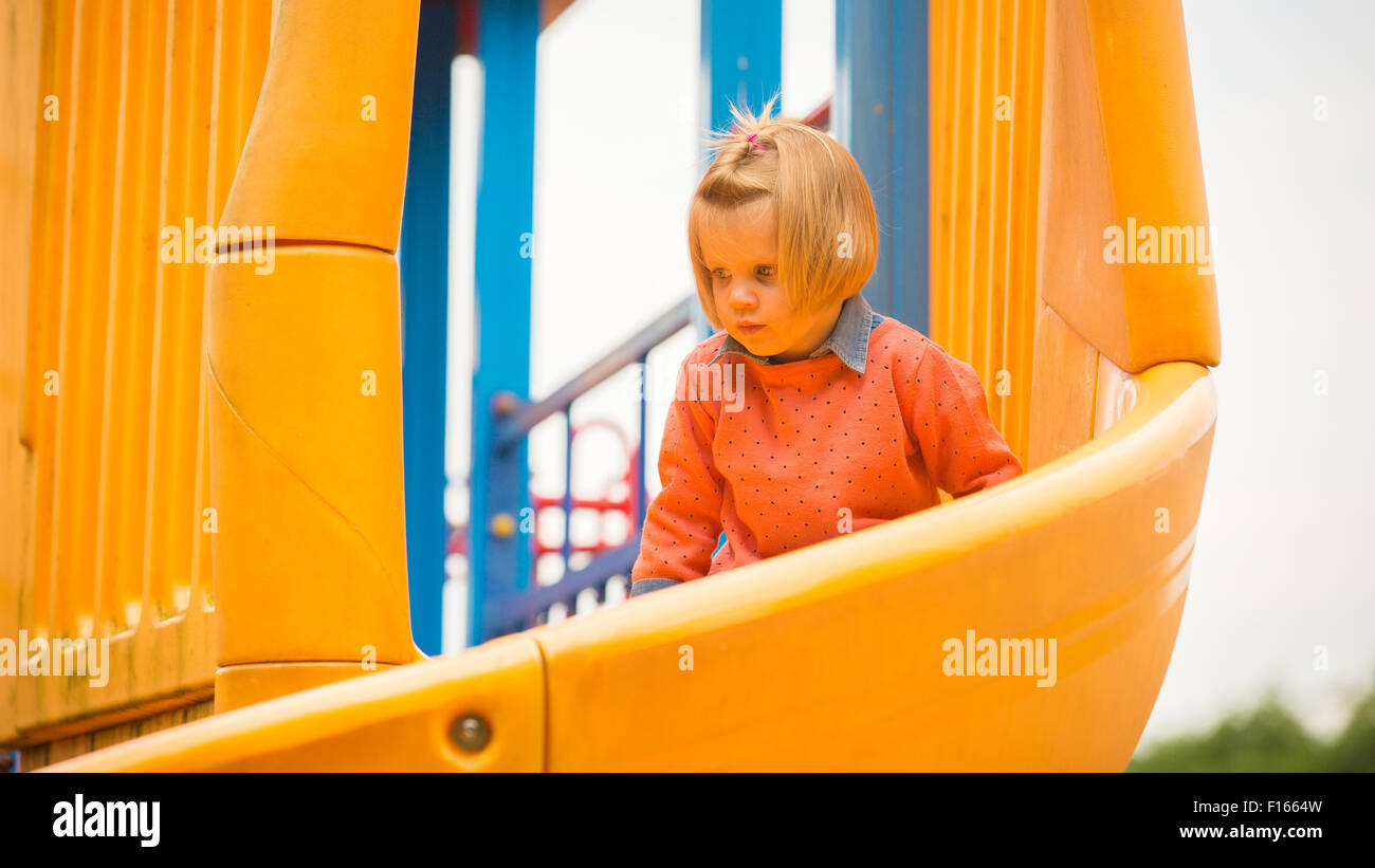 Outdoor portrait of adorable little girl playing in park Stock Photo ...