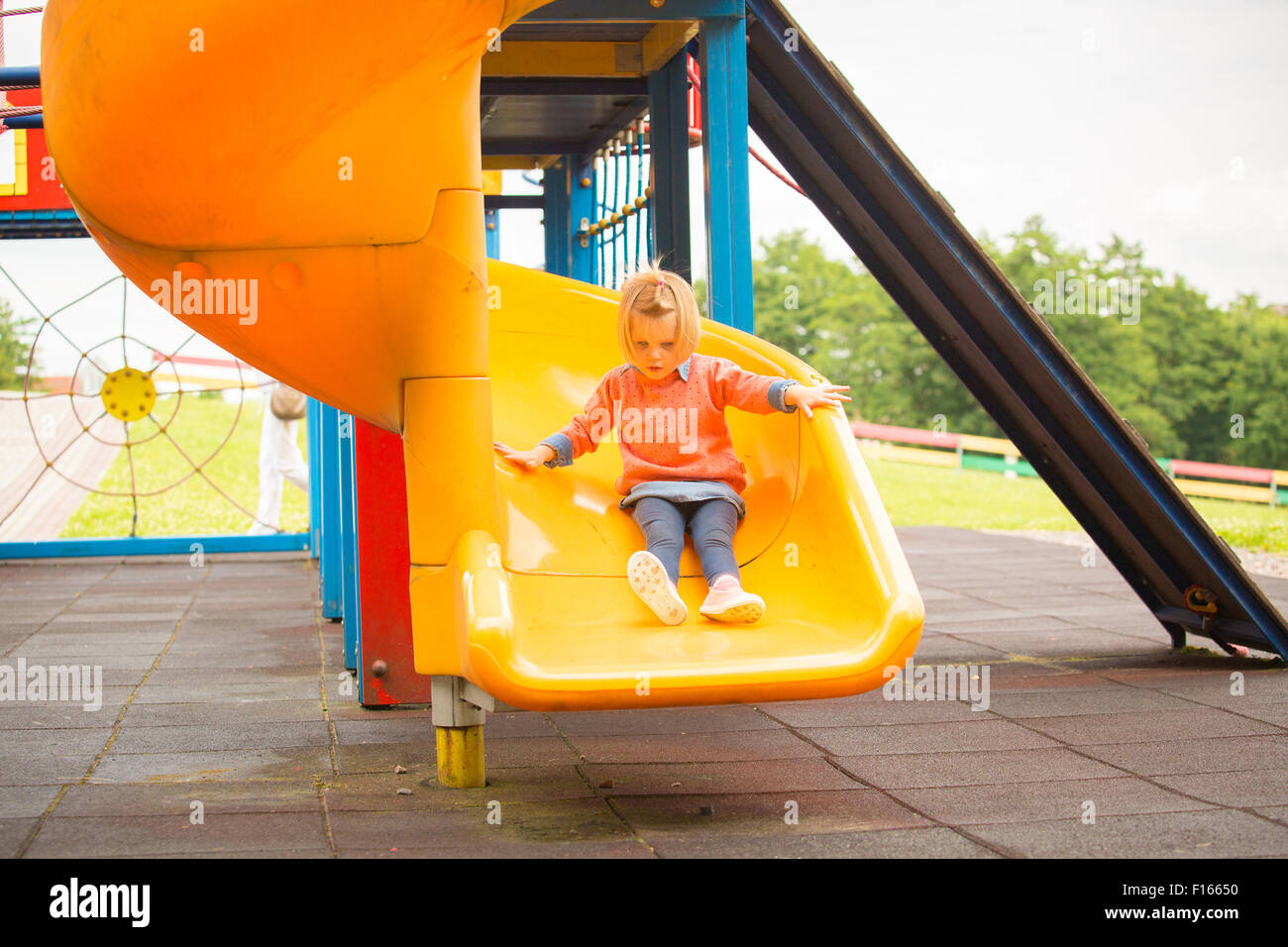 Outdoor portrait of adorable little girl playing in park Stock Photo ...