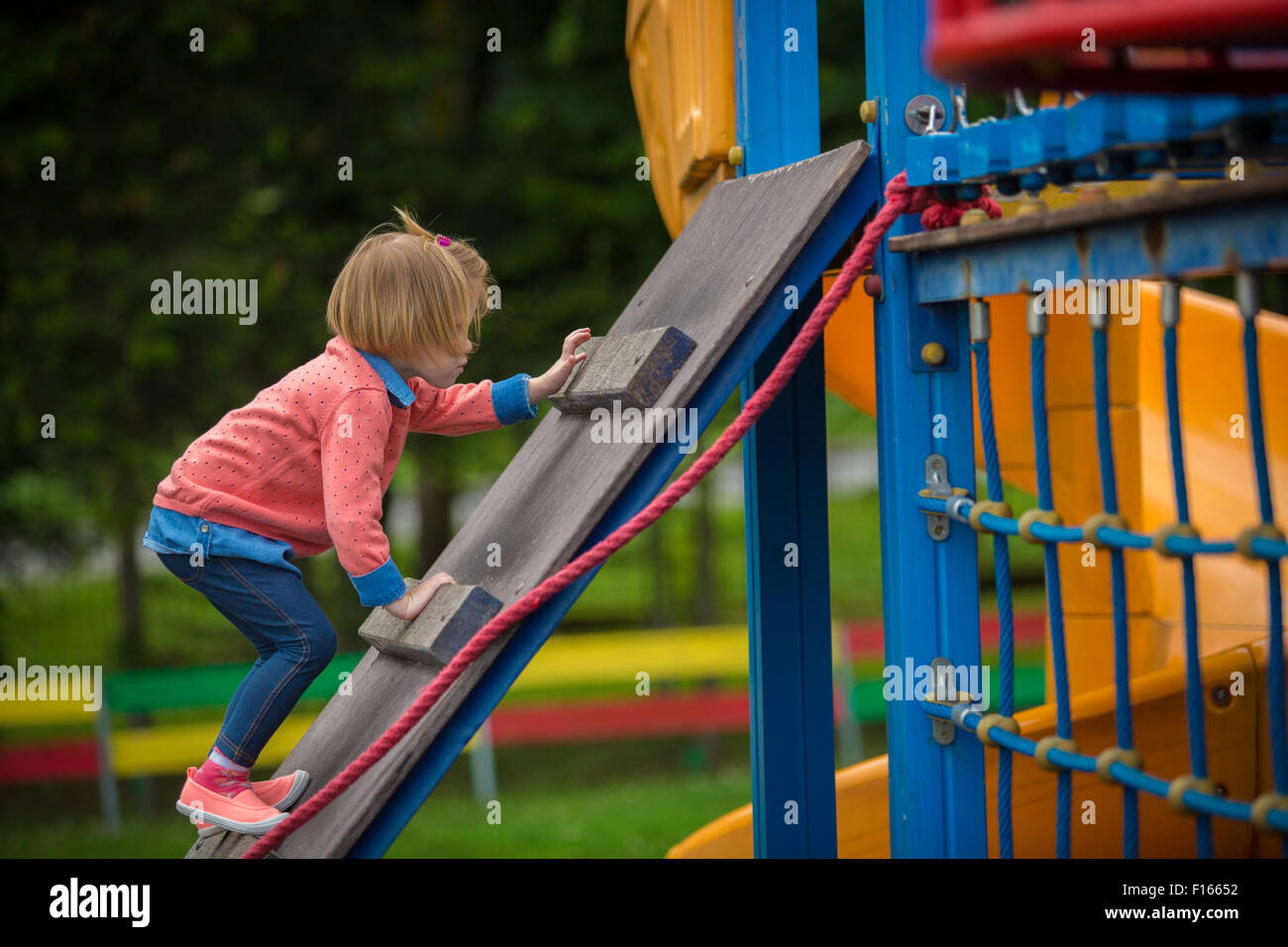 Outdoor portrait of adorable little girl playing in park Stock Photo ...