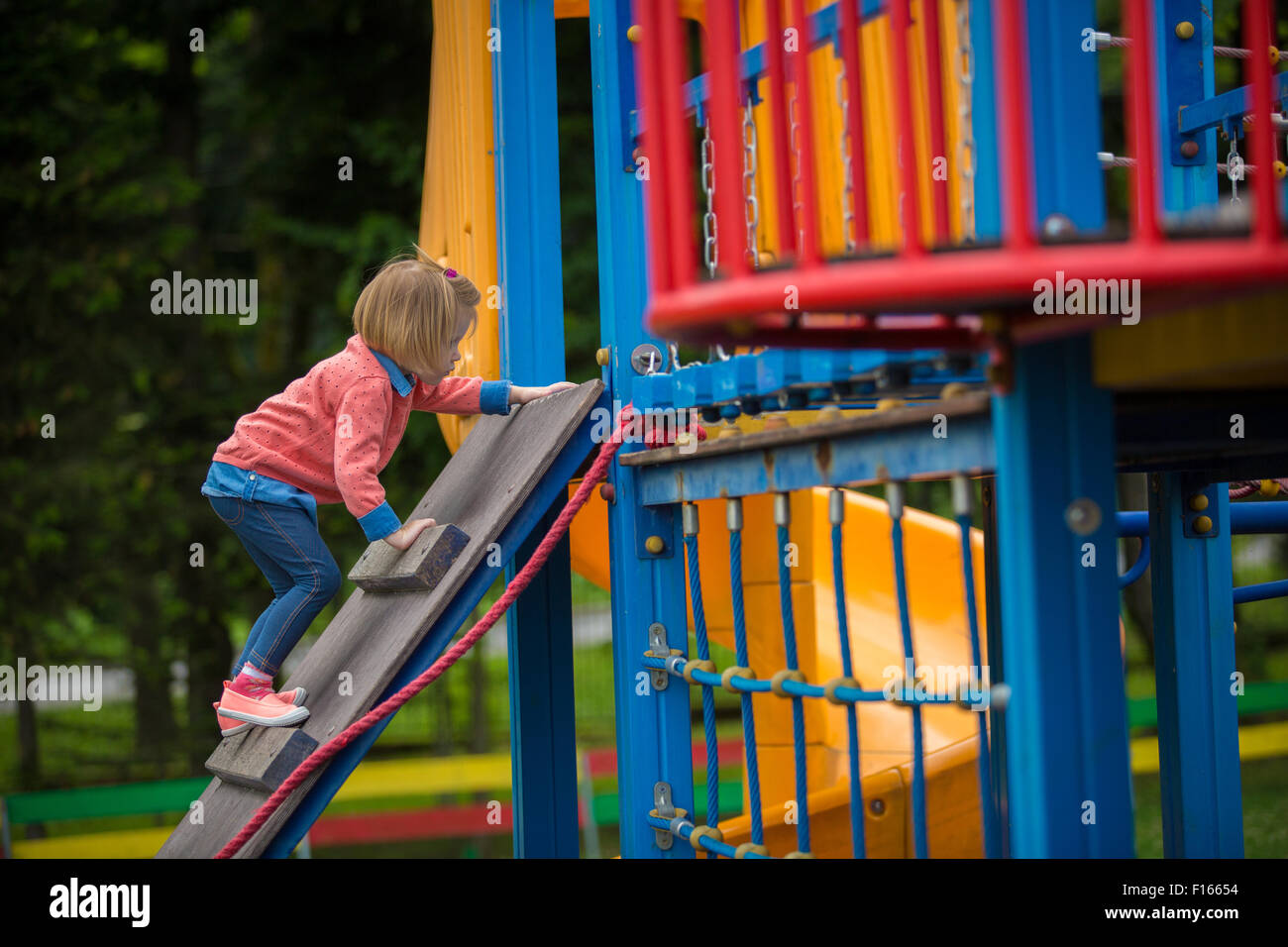 Outdoor portrait of adorable little girl playing in park Stock Photo ...