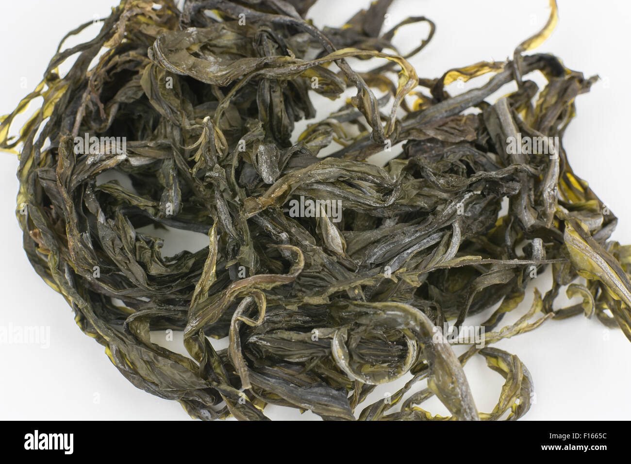 The seaweed Dabberlocks (Alaria esculenta), sometimes also referred to as Badderlocks. It is an edible seaweed, seen here dried. Stock Photo