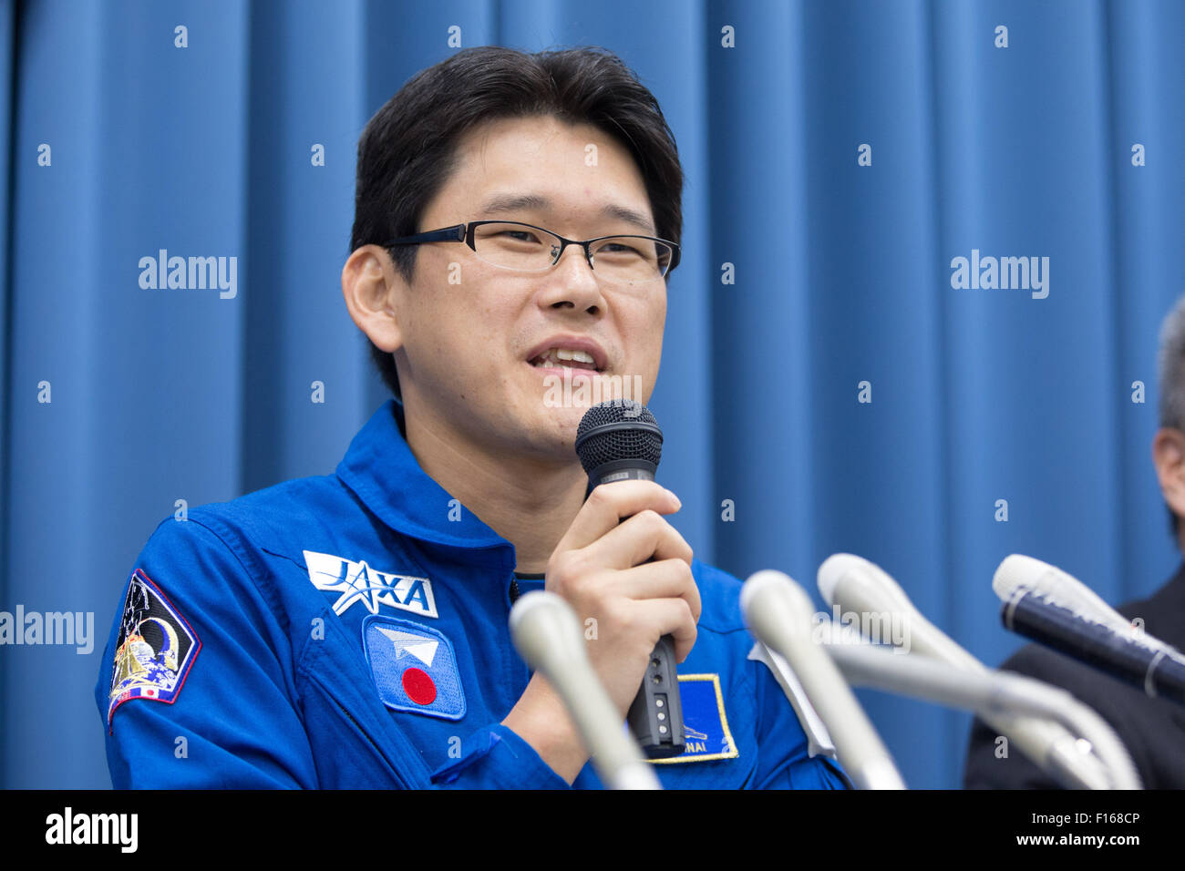 Tokyo, Japan. 27th Aug, 2015. Japanese astronaut Norishige Kanai speaks during a news conference at Tokyo office of the Japan Aerospace Exploration Agency on Thursday, August 27, 2015. Kanai, a 38-year-old former Maritime Self-Defense Force doctor, will travel into space and stay at the International Space Station for about six months from November 2017. He will be the 12th Japanese to travel into space and the seventh to stay for a prolonged period aboard the ISS. © AFLO/Alamy Live News Stock Photo