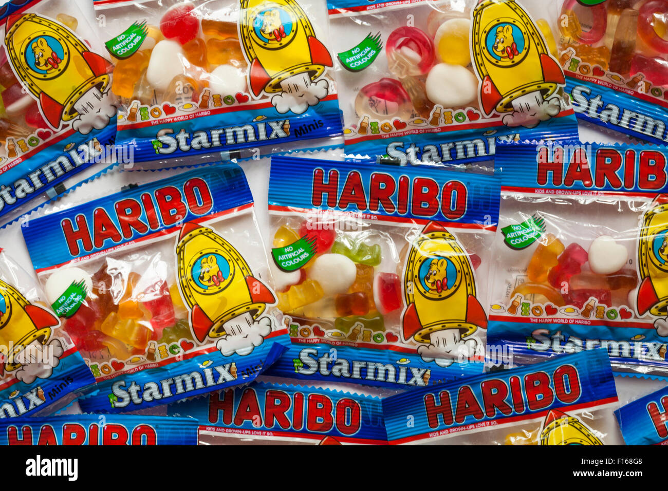 Packets of Haribo Starmix mini bags sweets on white background Stock Photo