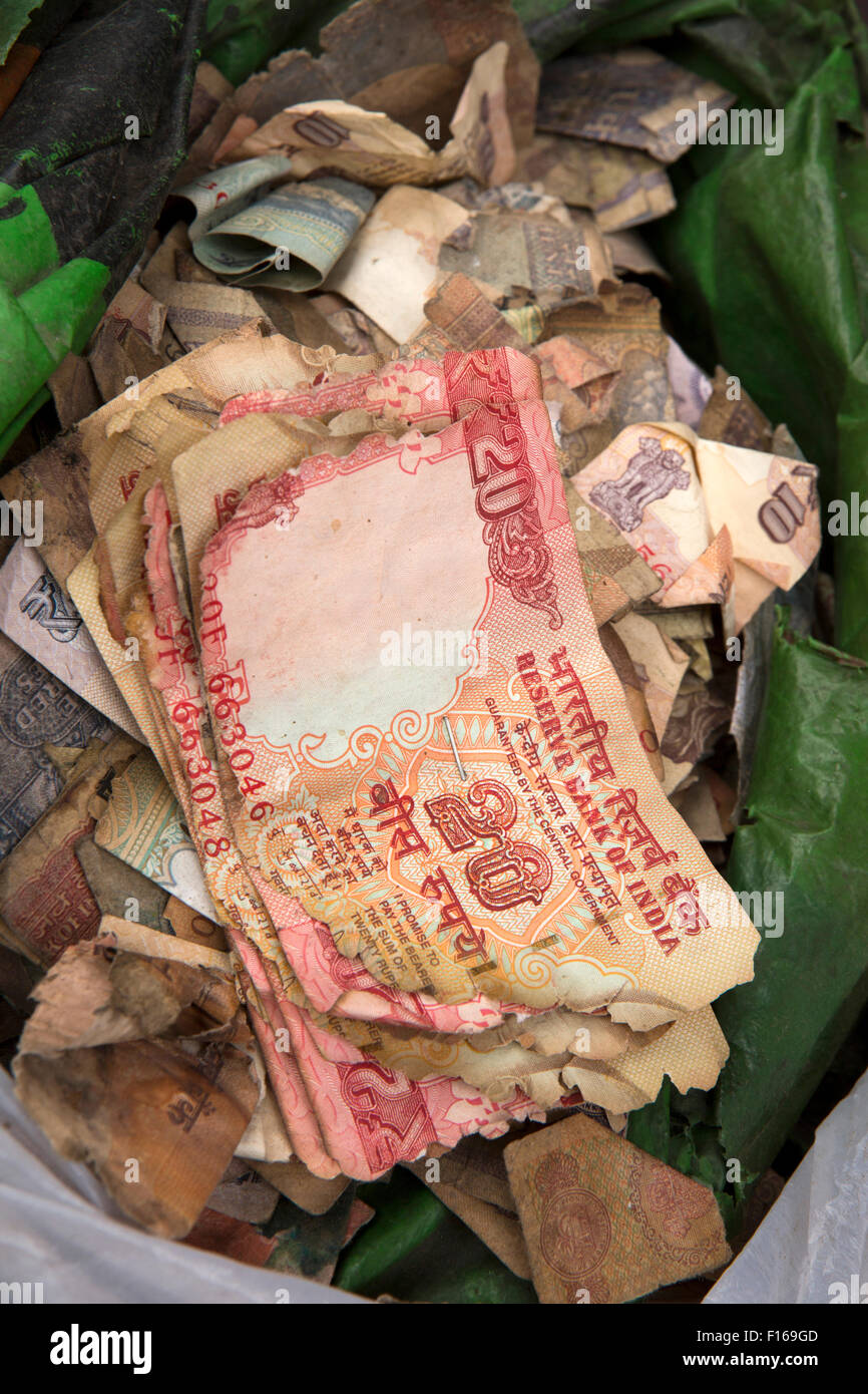 India, Jammu & Kashmir, Srinagar, old city, Sri Ranbir Gunj bazaar, bag of damaged Indian banknotes Stock Photo