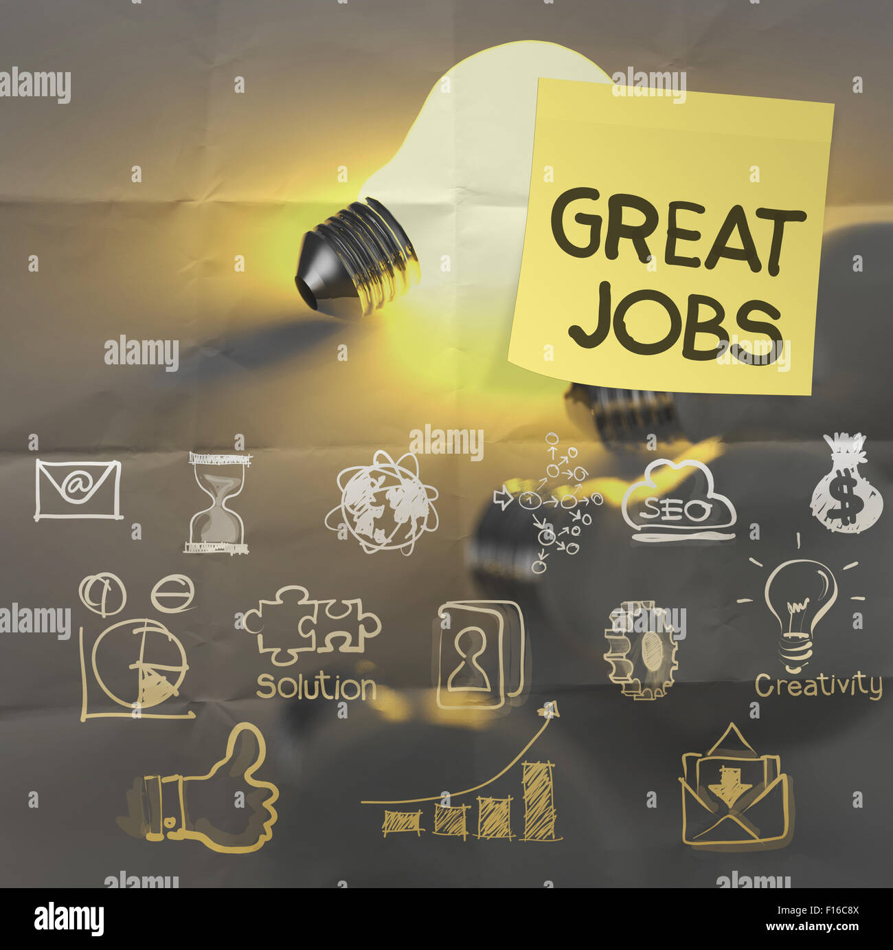 great jobs words sticky note on  lightbulb crumpled paper as concept Stock Photo