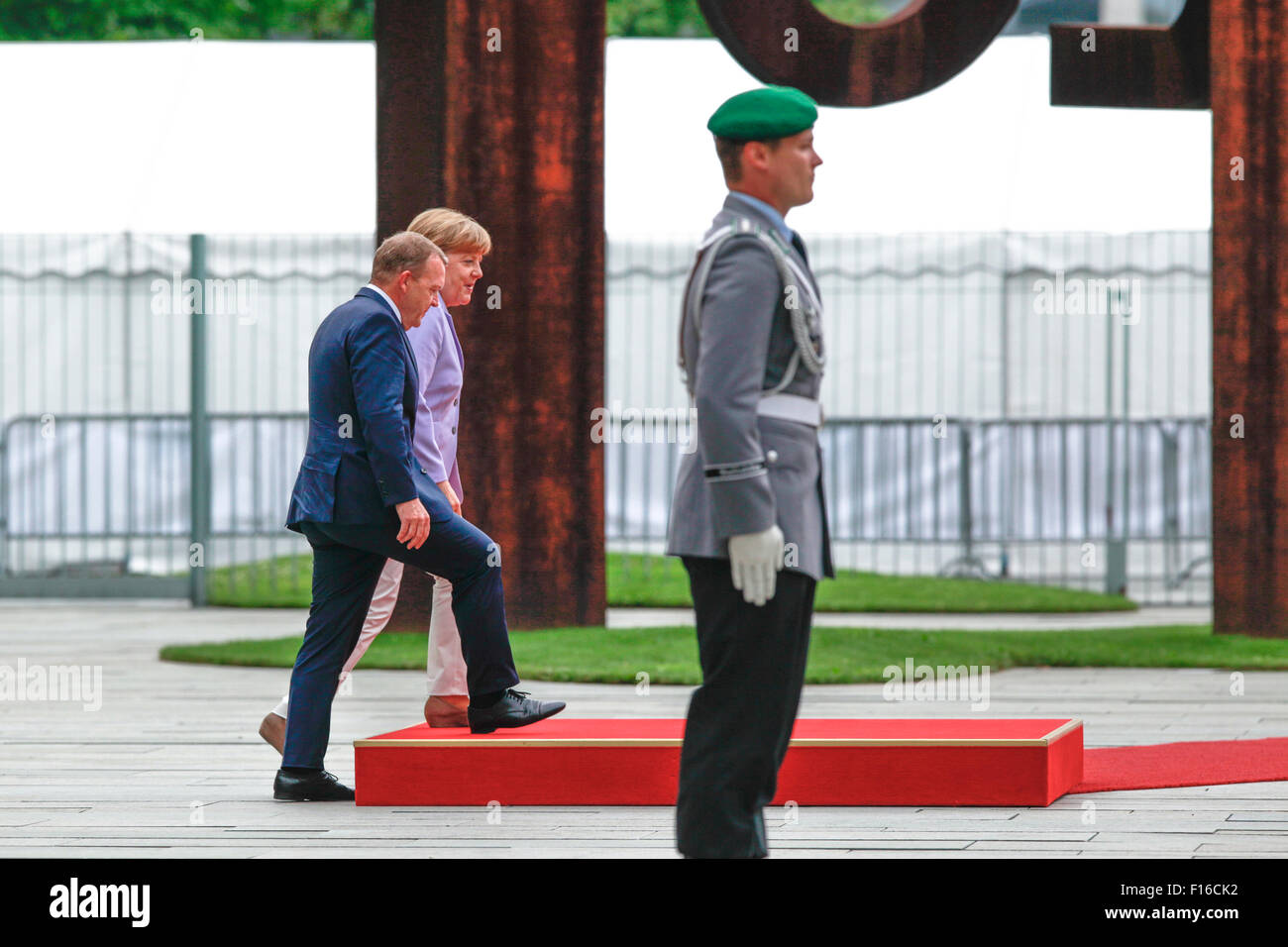 Berlin, Germany. 28th August, 2015. German Chancellor Angela Merkel welcomes Lars Løkke Rasmussen, Prime Minister of Denmark, with militar honors  at the German Chancellery in Berlin Germany on 28 August 2015. / Picture: German Chancellor Angela Merkel and Lars Løkke Rasmussen, Prime Minister of Denmark. Credit:  Reynaldo Chaib Paganelli/Alamy Live News Stock Photo