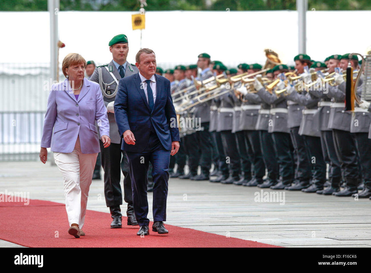 Berlin, Germany. 28th August, 2015. German Chancellor Angela Merkel welcomes Lars Løkke Rasmussen, Prime Minister of Denmark, with militar honors  at the German Chancellery in Berlin Germany on 28 August 2015. / Picture: German Chancellor Angela Merkel and Lars Løkke Rasmussen, Prime Minister of Denmark. Credit:  Reynaldo Chaib Paganelli/Alamy Live News Stock Photo