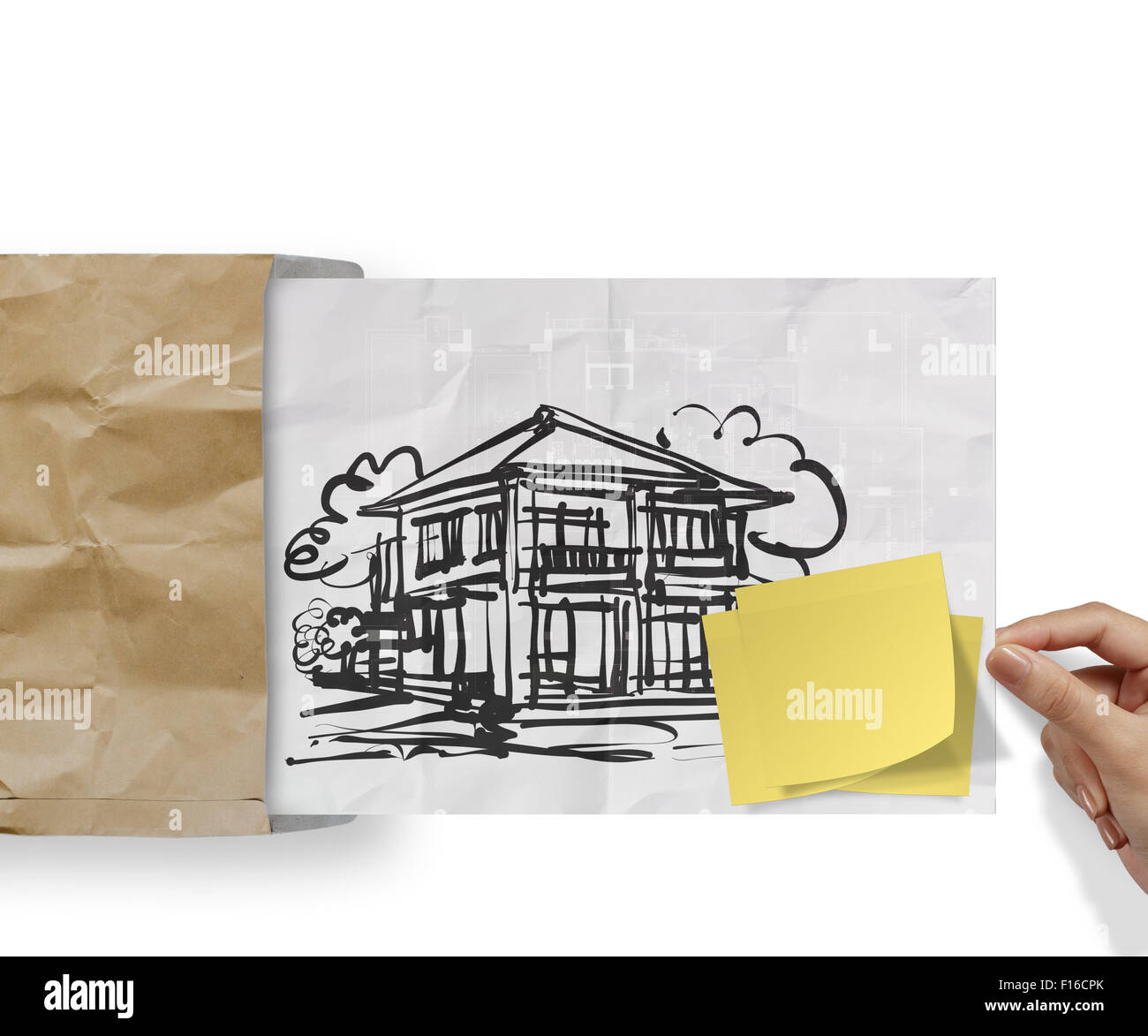 blank sticky note with house crumpled envelope paper as concept Stock