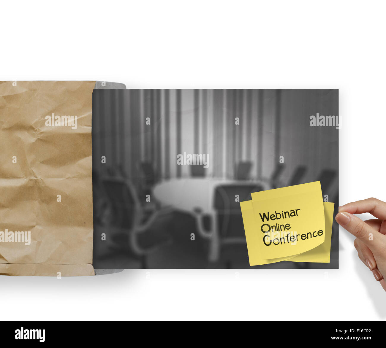 inar with sticky note on crumpled envelope paper background as