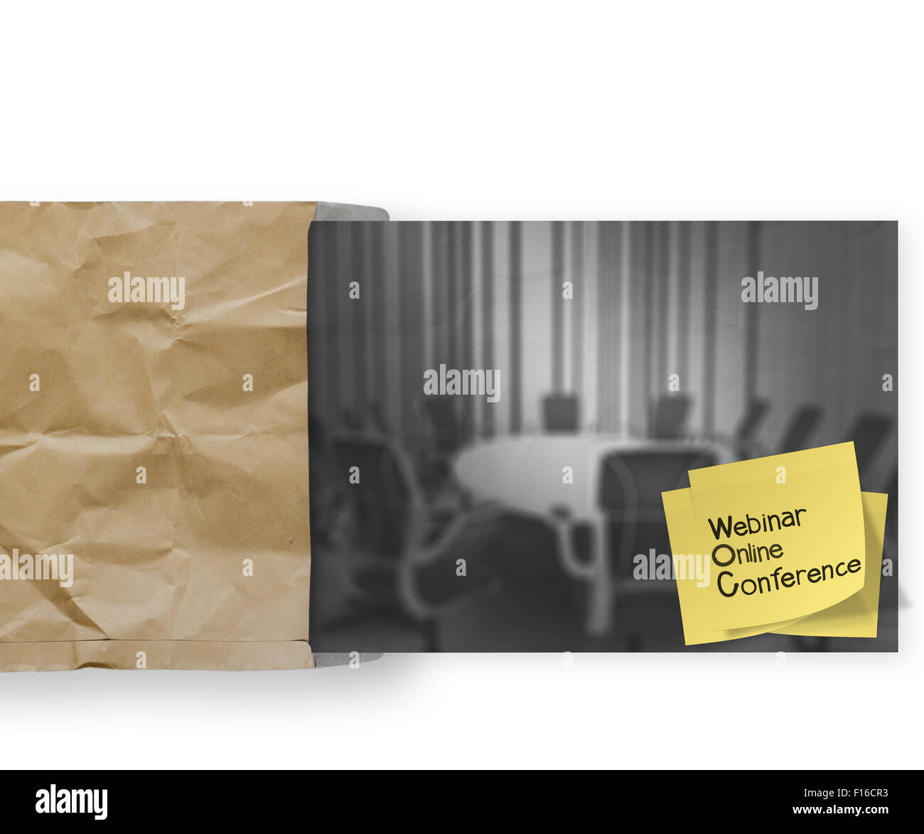 inar with sticky note on crumpled envelope paper background as