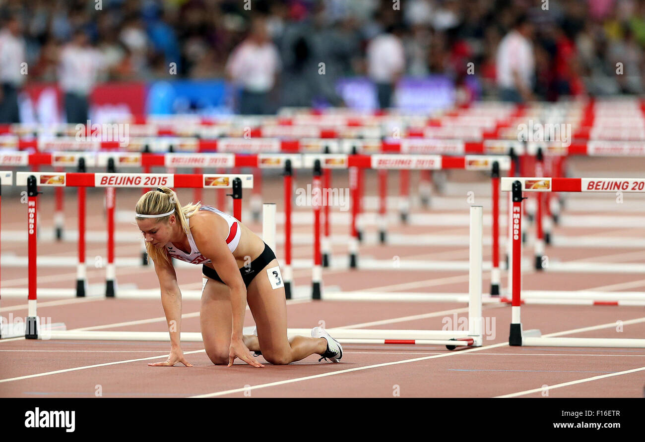Beijing, China. 28th Aug, 2015. Austria's Beate Schrott falls during the women's 100m hurdles semifinal at the 2015 IAAF World Championships at the 'Bird's Nest' National Stadium in Beijing, capital of China, Aug. 28, 2015. Credit:  Cao Can/Xinhua/Alamy Live News Stock Photo