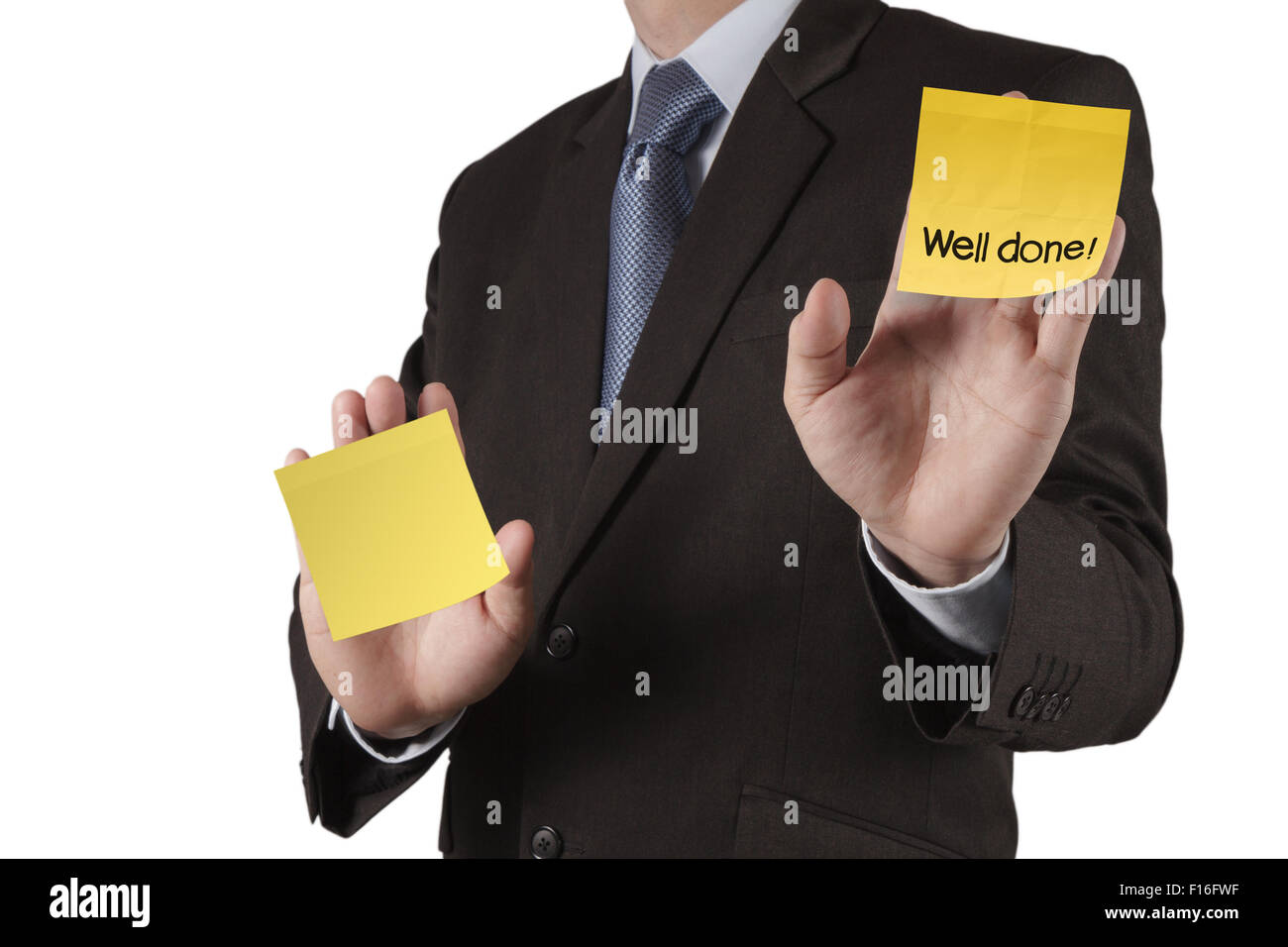 businessman hand show well done words on sticky note with white background as concept Stock Photo