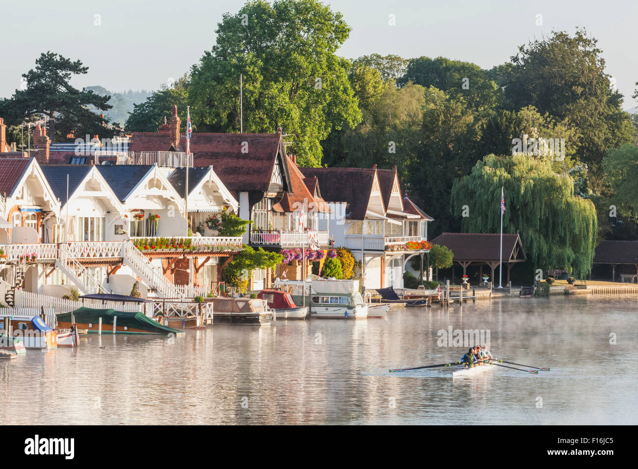 England, Oxfordshire, HenleyonThames, Boathouses and Rowers on River