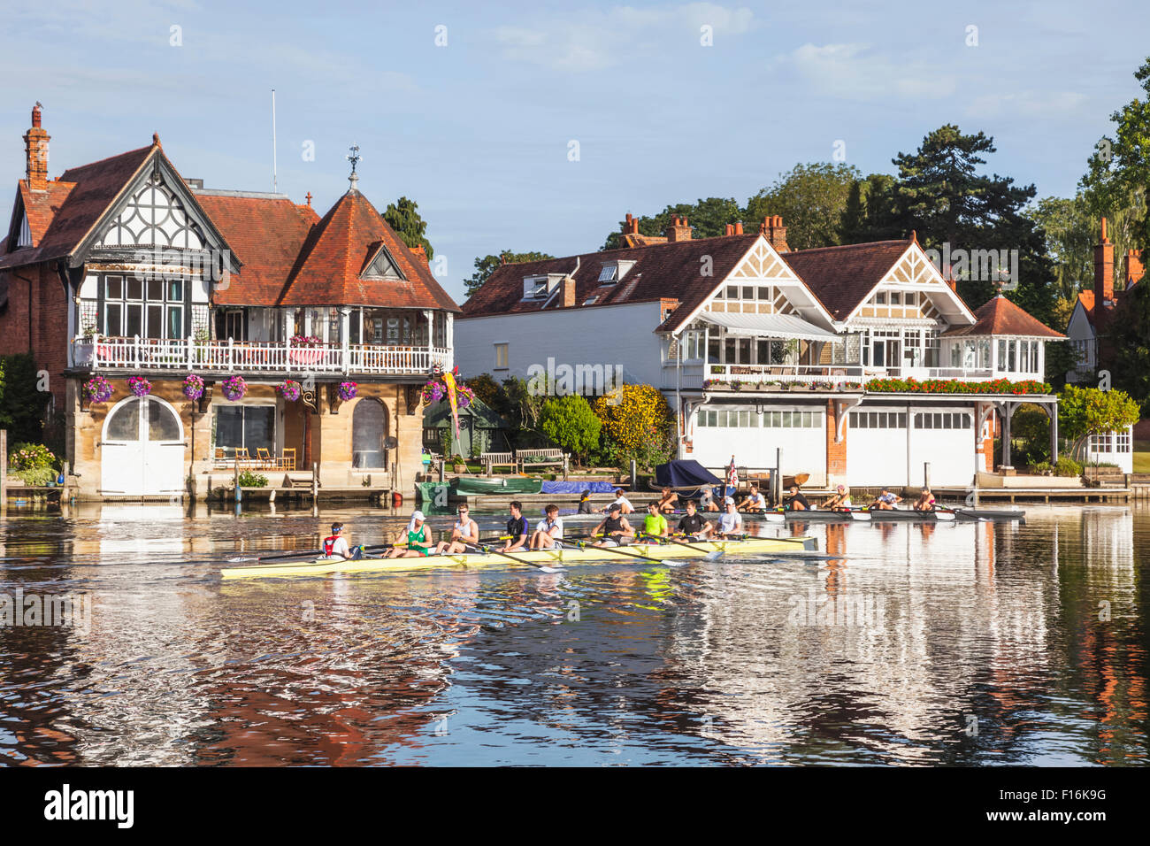 England, Oxfordshire, HenleyonThames, Boathouses and Rowers on River