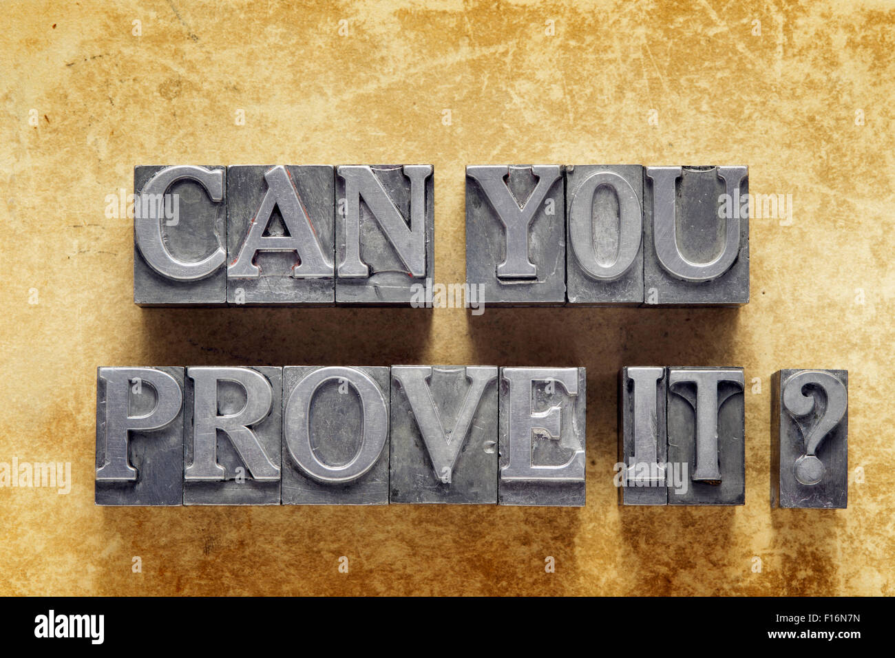 can you prove it question made from metallic letterpress type on vintage cardboard Stock Photo