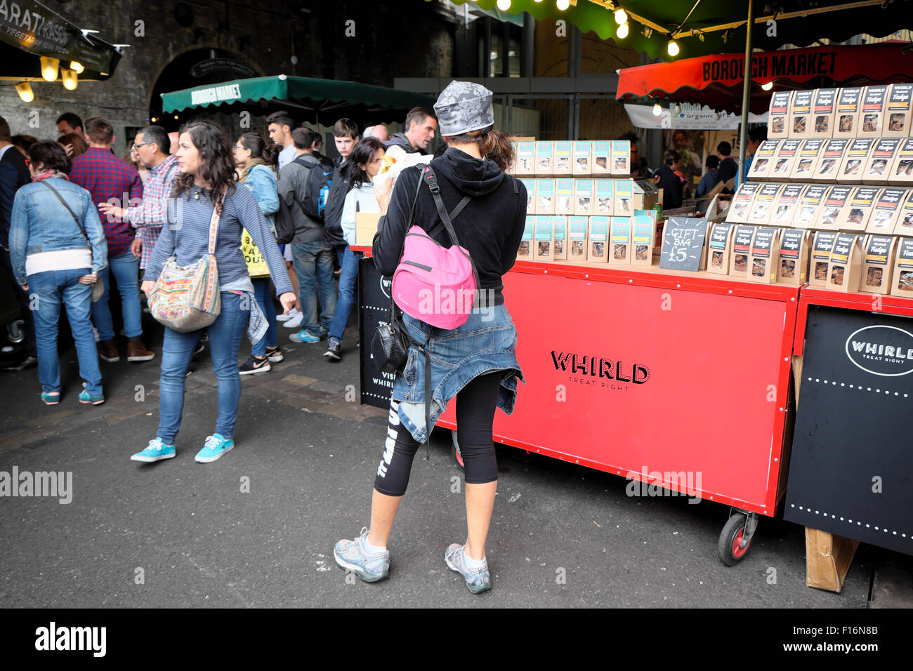People outside Whirld Fudge Stand at Borough Market London UK  KATHY DEWITT Stock Photo