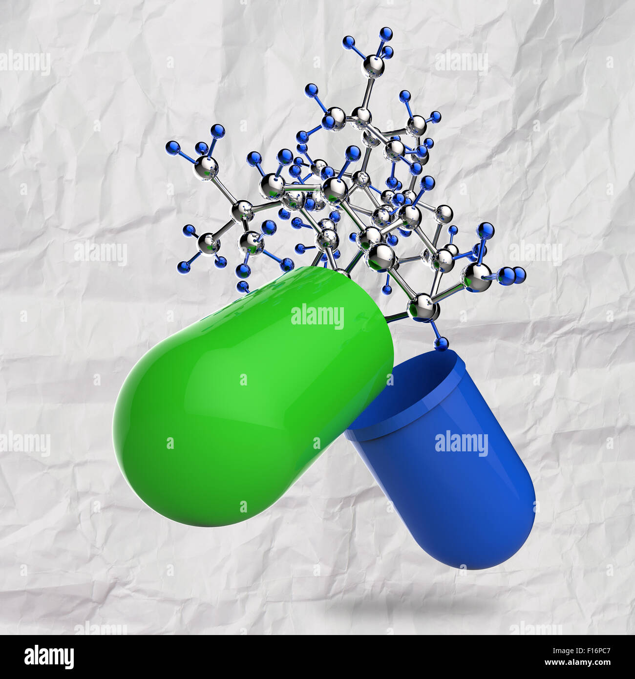 green medical capsule and molecule structure on crumpled paper as ...