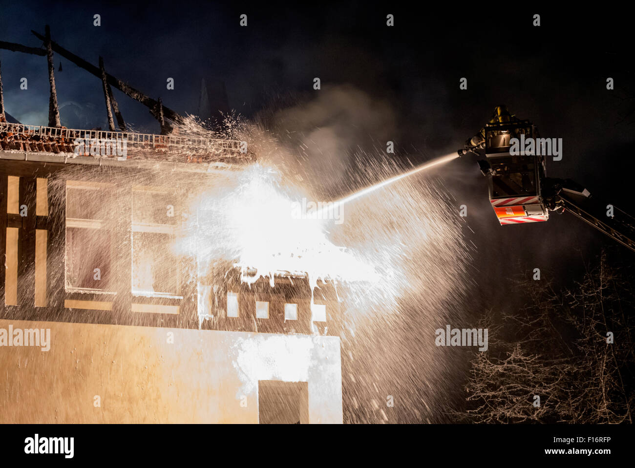 Berlin, Germany, unloading, the fire department with a roof fire Stock Photo