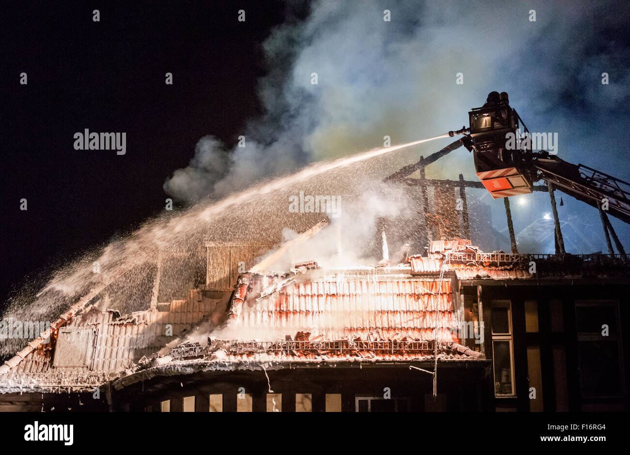Berlin, Germany, unloading, the fire department with a roof fire Stock Photo