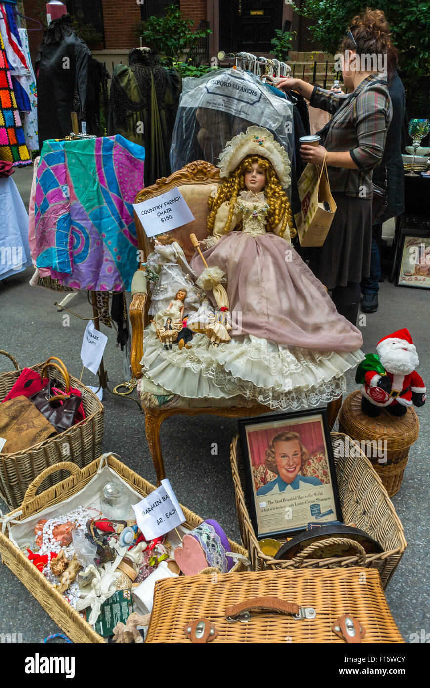 New York City, USA, Woman Shopping, Vintage Toys, Clothes on Display at Chelsea Street Flea Market, Summer Stock Photo