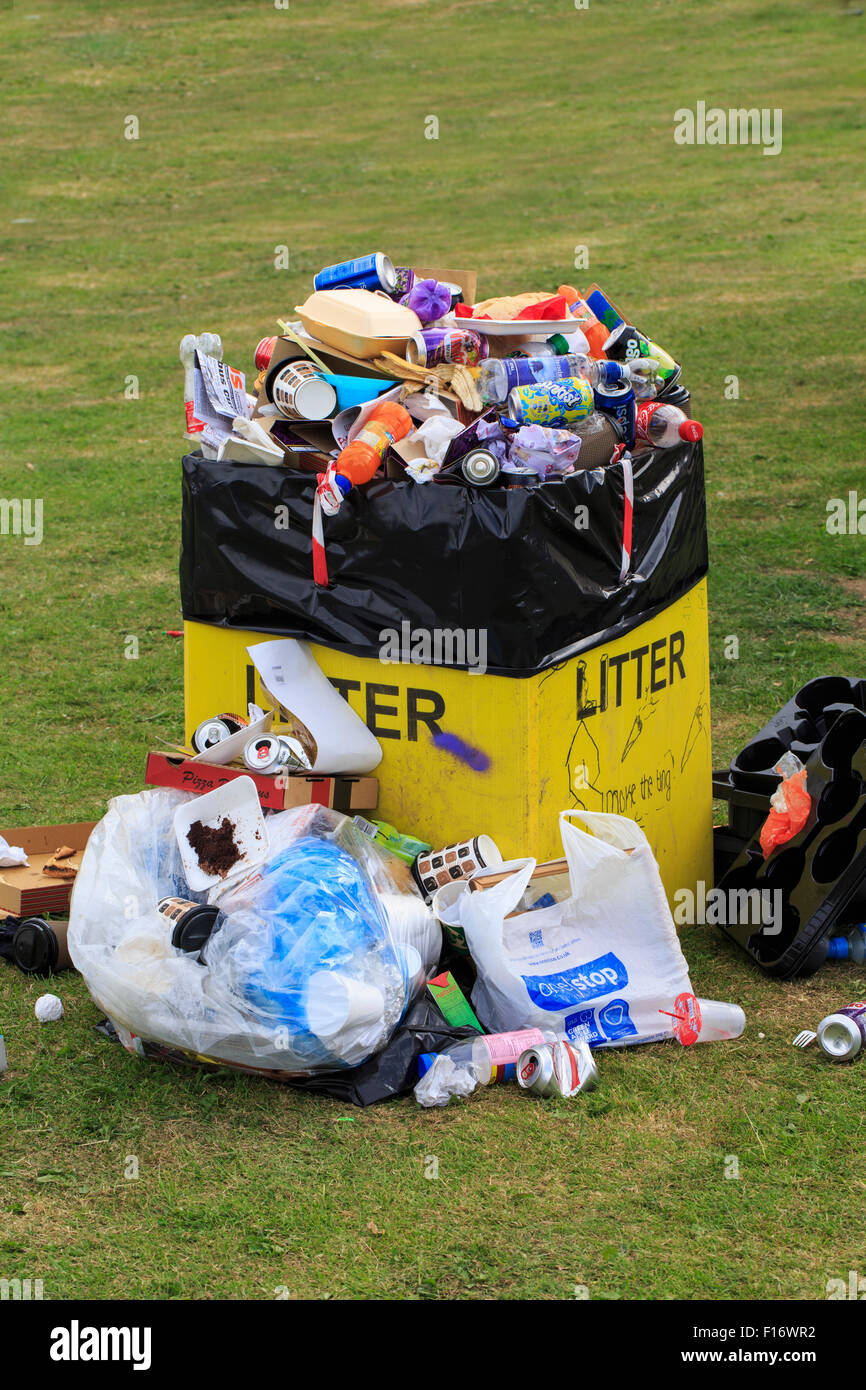 Overflowing litter bin at local event Stock Photo