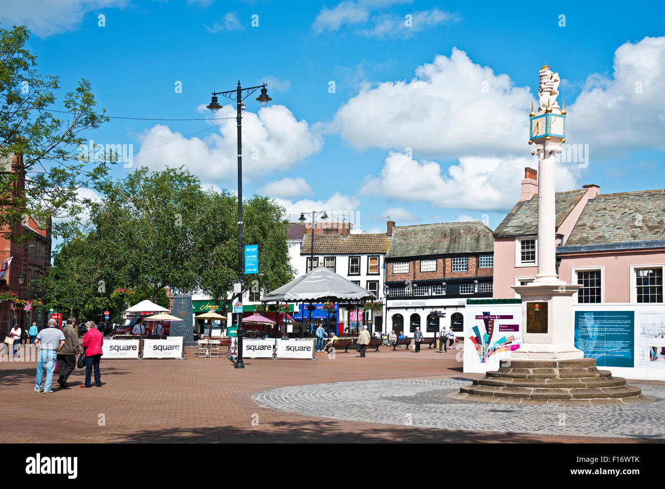 Market Cross Town Square and Old Town Hall in summer Carlisle Cumbria England UK United Kingdom GB Great Britain Stock Photo