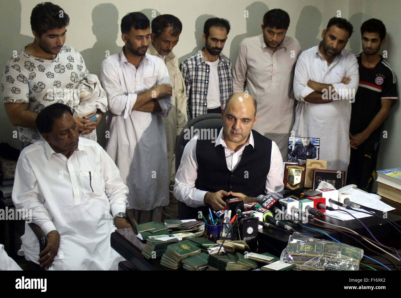 Director FIA Ashfaq Alam addressing to media persons during a briefing about detention of Iranian people who entered into Pakistan illegally through the Diwani coastal line of Pak-Iran, at FIA Immigration Cell office in Karachi on Friday, August 28, 2015. Stock Photo