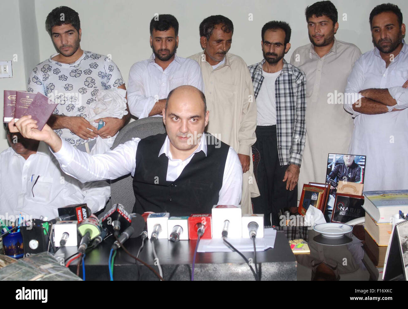 Director FIA Ashfaq Alam addressing to media persons during a briefing about detention of Iranian people who entered into Pakistan illegally through the Diwani coastal line of Pak-Iran, at FIA Immigration Cell office in Karachi on Friday, August 28, 2015. Stock Photo