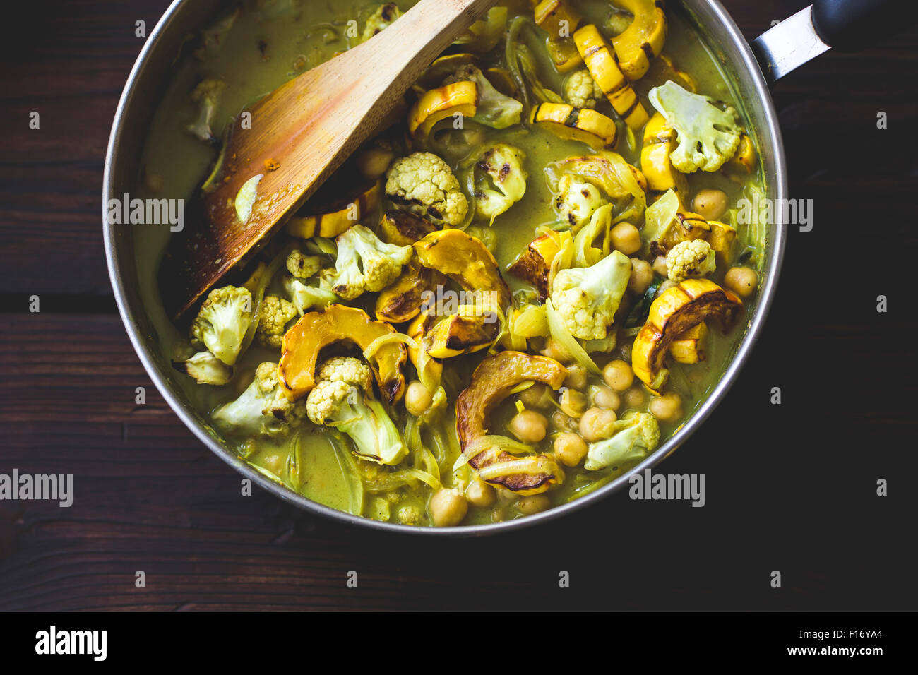 Roasted delicata squash curry with chickpeas and cauliflower. Stock Photo