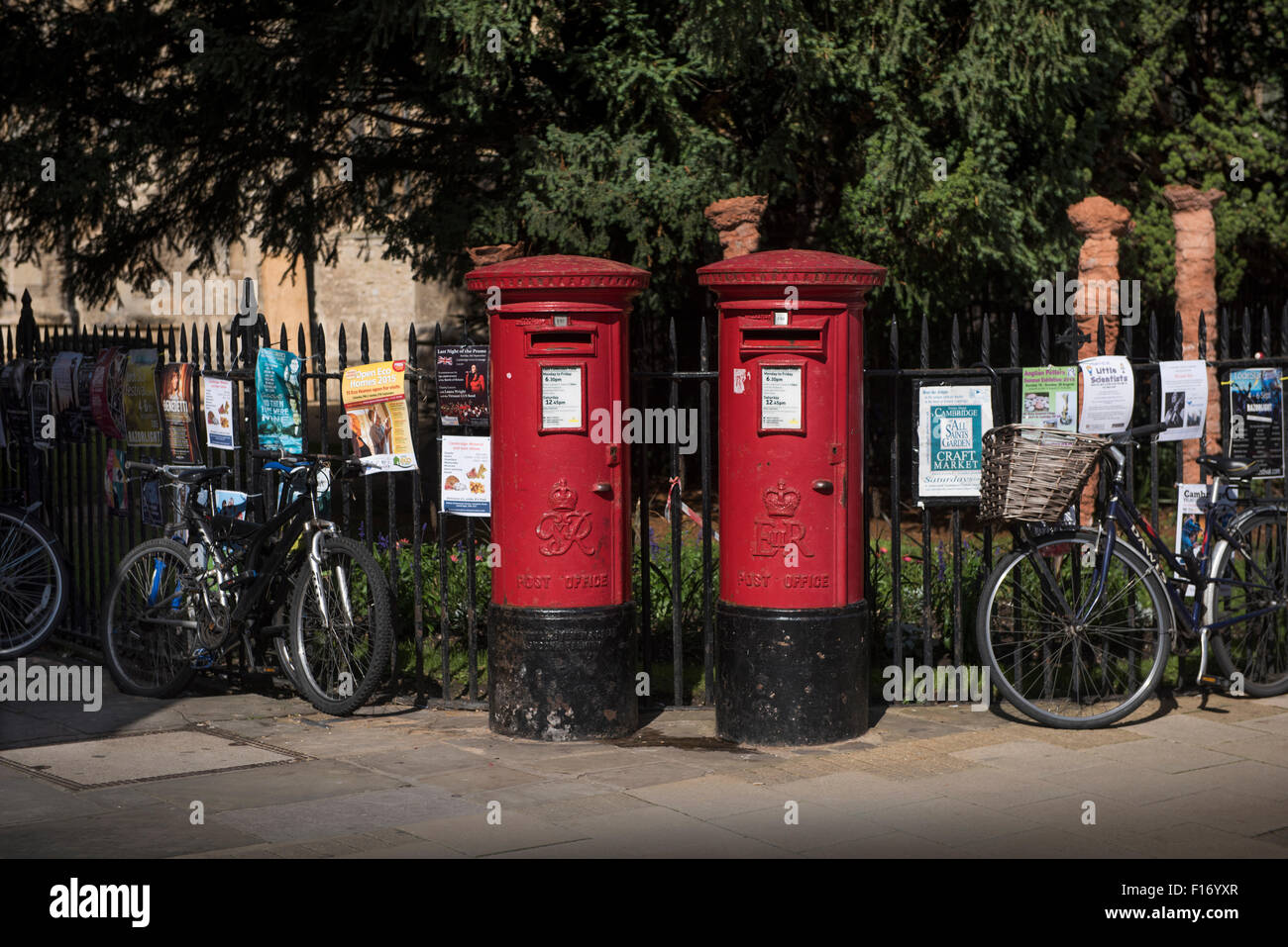 Red Post Office Pillar Boxes in Cambridge, Cambridgeshire, England UK. August 2015 Traditional red post boxes in Cambridge, the Stock Photo