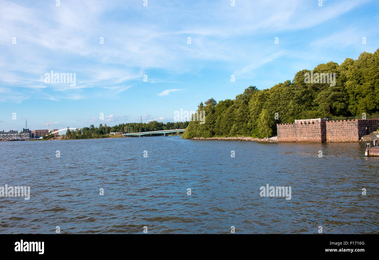 Coastline of Helsinki city during sunny summer day. Deep blue sky. Stock Photo