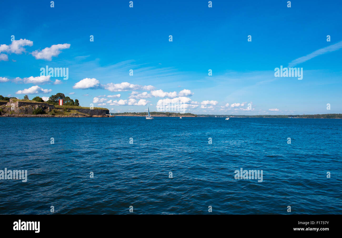 Coastline of Helsinki city during sunny summer day. Deep blue sky. Stock Photo